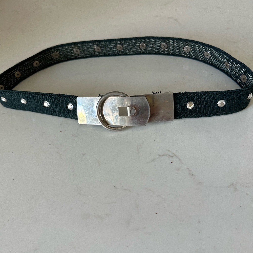 Black stretch belt with silver metal buckle and Rhinestones all around